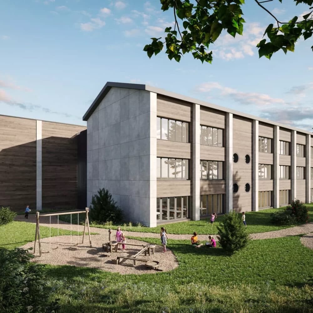 Modern multi-story school building with wood and concrete panels, surrounded by a green lawn and trees, with children playing in a courtyard.